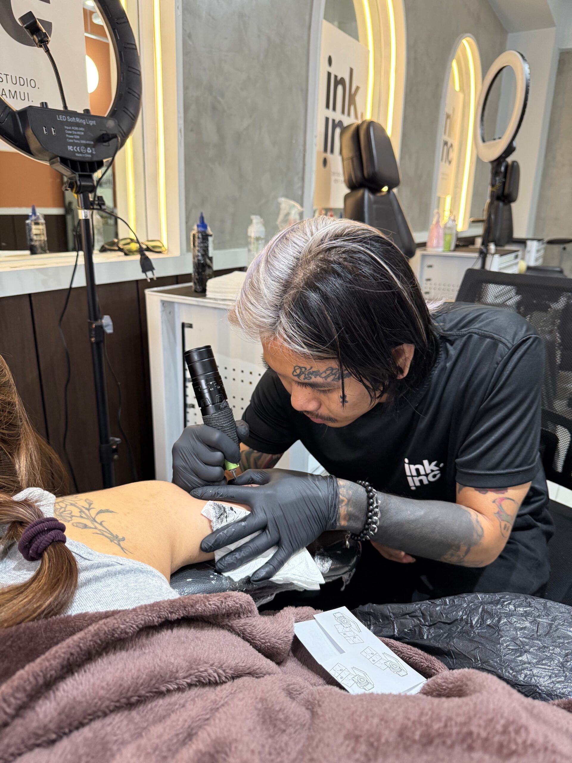 A finished, vibrant color tattoo on an arm.
