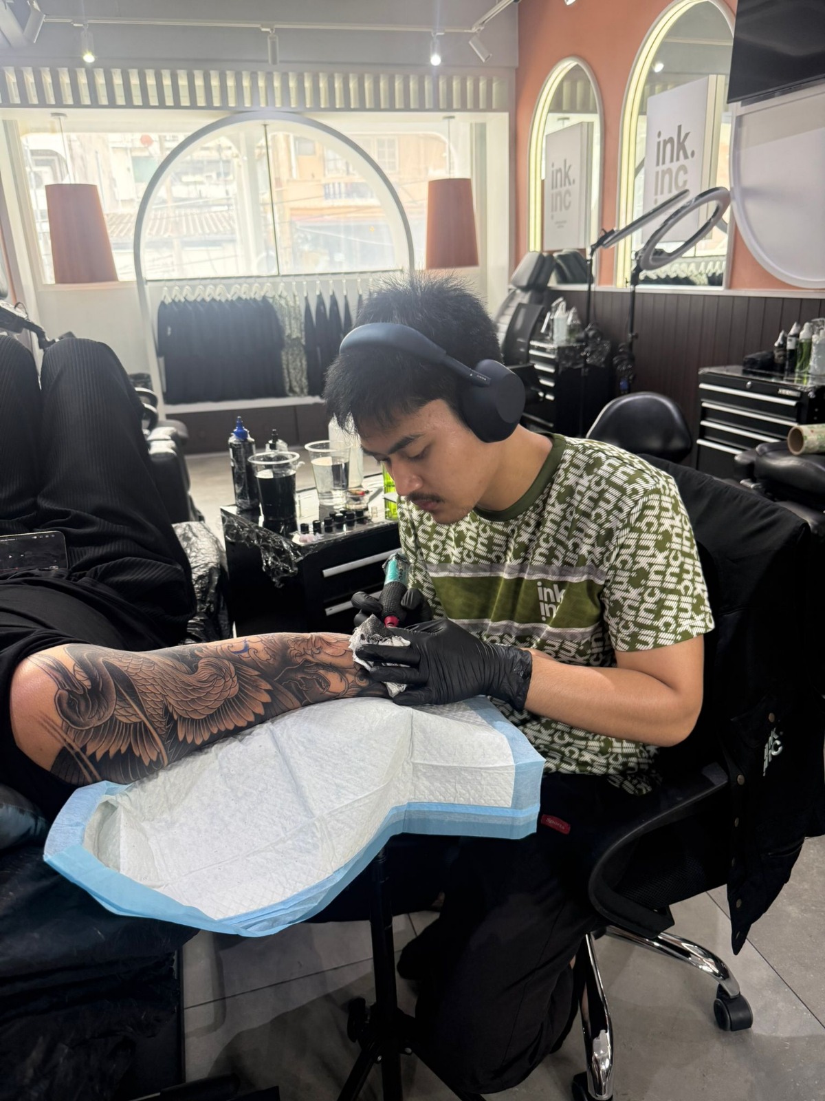 A finished, vibrant color tattoo on an arm.